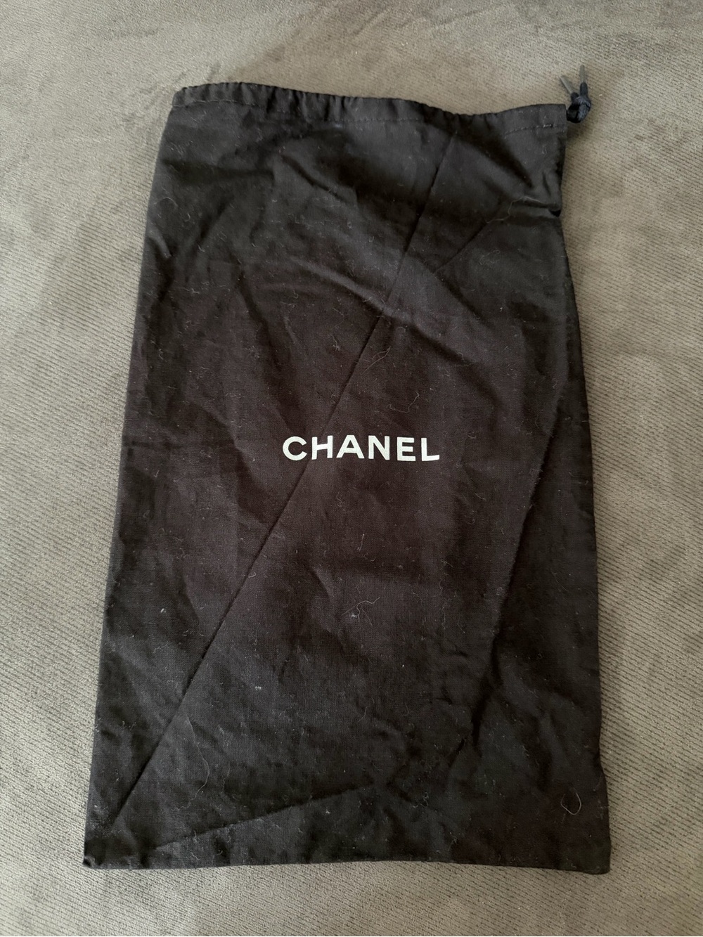 CHANEL Black Dust Pouch with White Logo